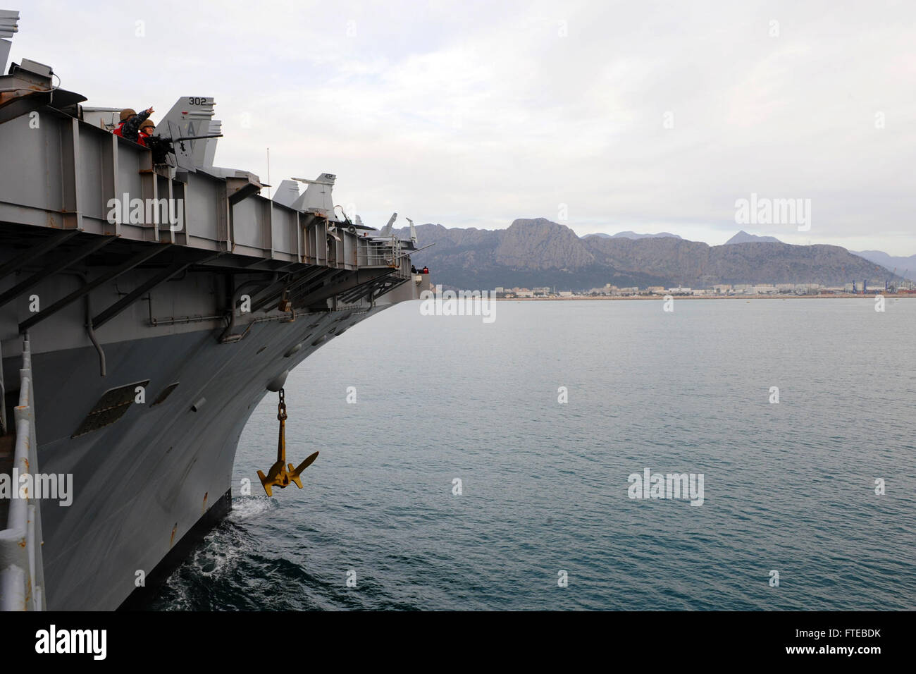 140309-N-CZ979-098 ANTALYA, Turkey (Mar. 9, 2014) The aircraft carrier USS George H.W. Bush (CVN 77) drops anchor in Antalya, Turkey. George H. W. Bush is on a scheduled deployment supporting maritime security operations and theater security cooperation efforts in the U.S. 6th Fleet area of operations.  (U.S. Navy photo by Mass Communication Specialist 3rd Class Joshua Card/Released) Stock Photo