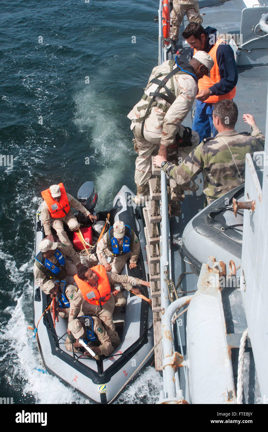 ATLANTIC OCEAN (March 10, 2014) A Royal Mauritanian Navy Maritime Interdiction Operations (MIO) team boards the French patrol ship Commandant Birot (F 796) to simulate an investigation of illegal fishing during a Saharan Express 2014.  Saharan Express is an international maritime security cooperation exercise designed to improve safety and security in West Africa. (U.S. Navy photo by Mass Communication Specialist 3rd Class Robert S. Price/Released) Stock Photo