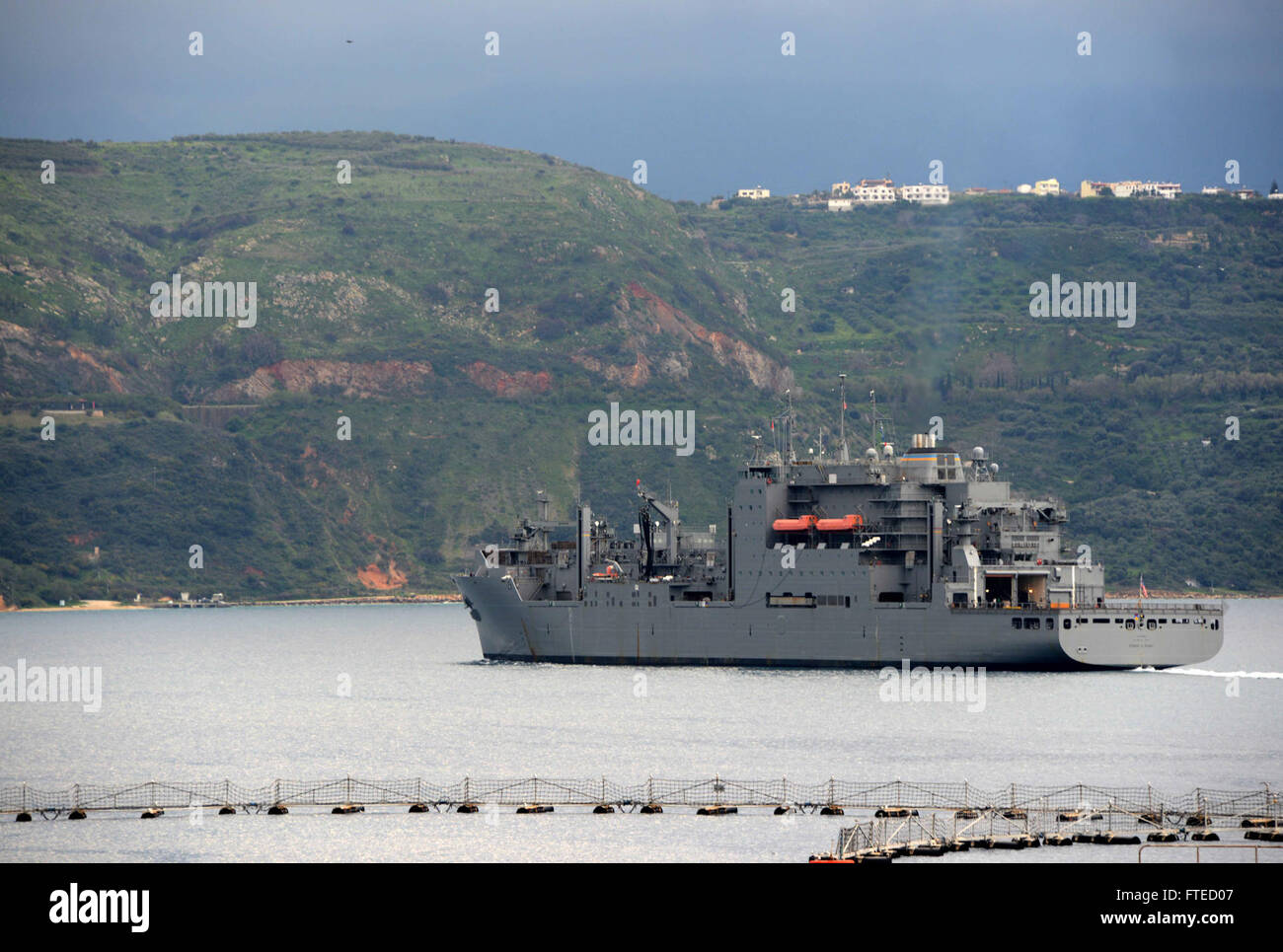 SOUDA BAY, Greece (Mar. 10, 2014) – The Military Sealift Command USNS Robert E. Peary (T-AKE-5) departs Souda Bay after a scheduled port visit. Peary, a Lewis and Clark-Class dry cargo ship able to transport over 6,000 tons of dry cargo and provide helicopter air support, is manned by a compliment of military and Civil Service Mariners. Stock Photo