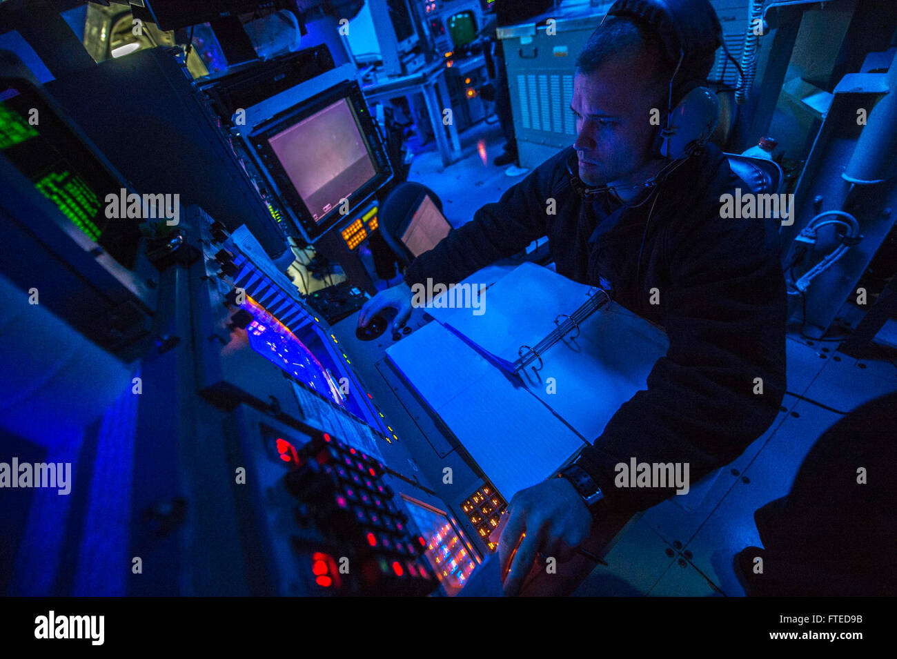 Console Radar Set Gunner's Mate 1st Class Alvin Johnson monitors a radar console on the ...
