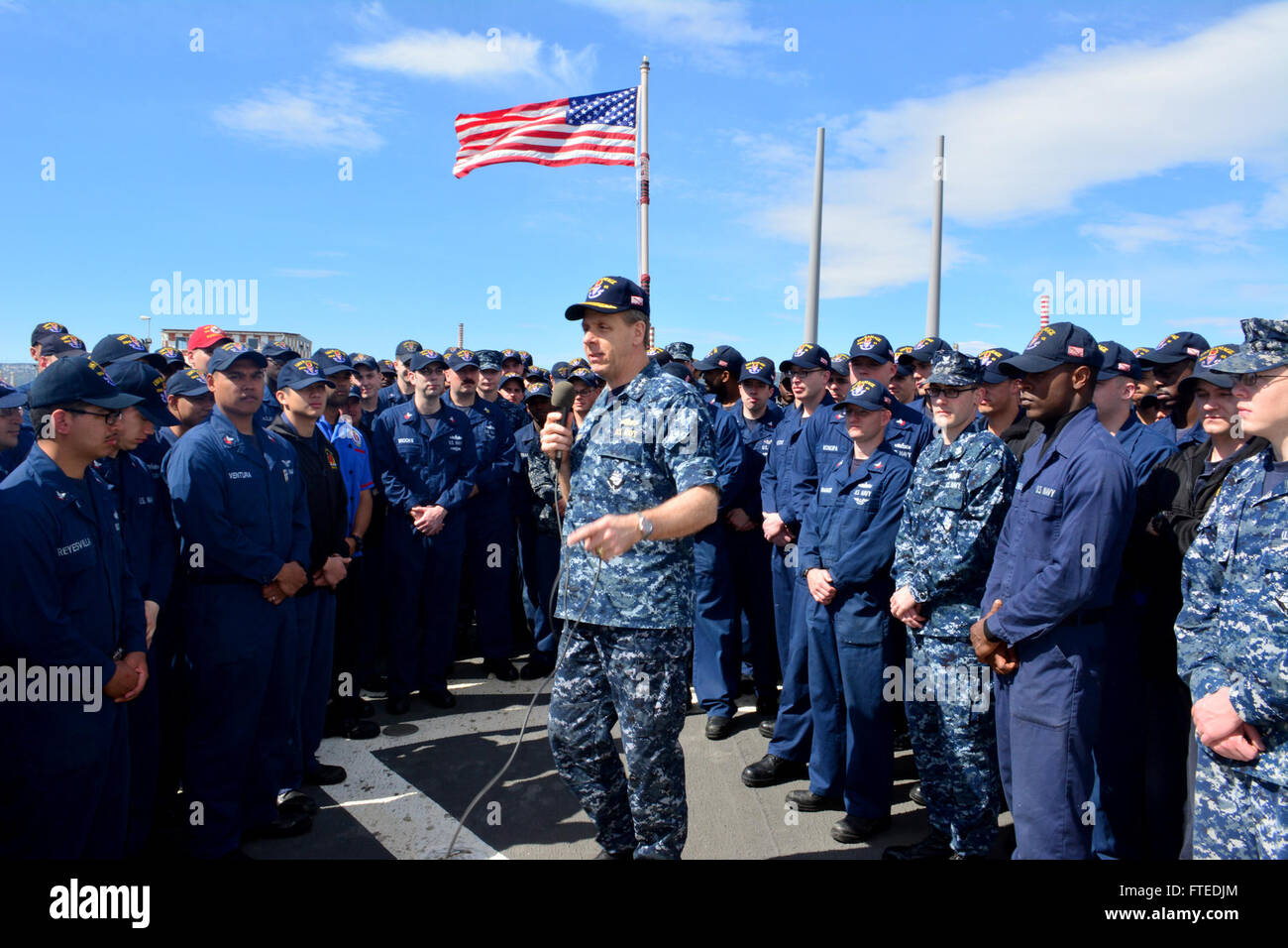 140417-N-ZZ999-002: AUGUSTA BAY, Italy (April 17, 2014) - Vice Adm. Phil Davidson, commander, U.S. 6th Fleet, addresses the crew during an all-hands call aboard the guided-missile destroyer USS Ramage (DDG 61). Ramage, homeported in Norfolk, Va., is on a scheduled deployment supporting maritime security operations and theater security cooperation efforts in the U.S. 6th Fleet area of operations. (U.S. Navy photo by Seaman Kenneth Moore/Released)   Join the conversation on Twitter ( https://twitter.com/naveur navaf )  follow us on Facebook ( https://www.facebook.com/USNavalForcesEuropeAfrica )  Stock Photo