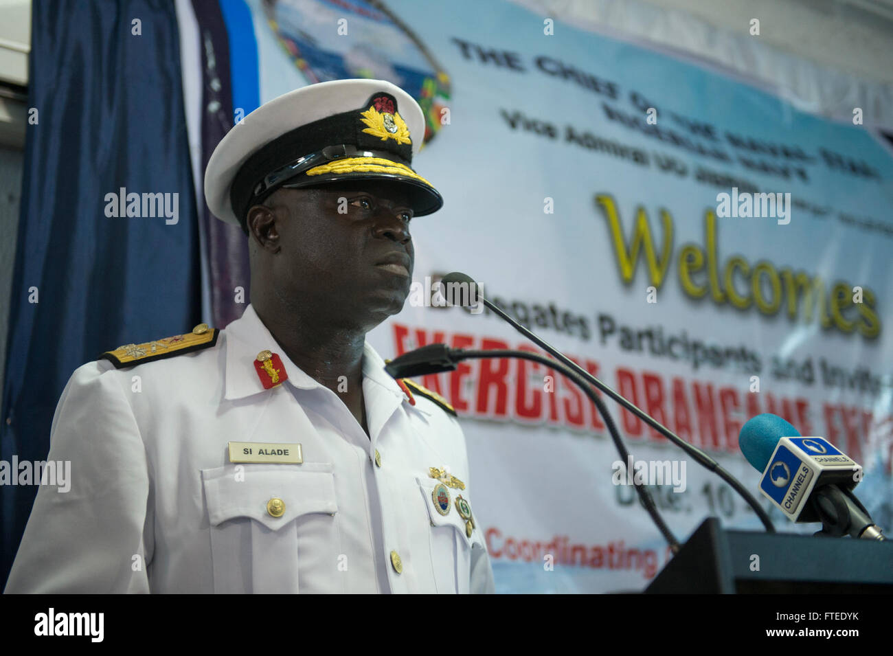 140423-N-IY142-099 LAGOS, Nigeria (April 23, 2014) - Rear Adm. S. I. Alade, flag officer commanding Nigerian navy Western Naval Command, delivers remarks during the closing ceremony of Obangame Express 2014. Obangame Express is a U.S. Africa Command-sponsored multinational maritime exercise designed to increase maritime safety and security in the Gulf of Guinea. (U.S. Navy photo by Mass Communication Specialist 2nd Class John Herman/Released) Stock Photo