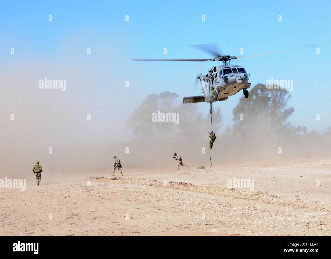 This image shows a Sailor assigned to Explosive Ordnance Disposal ...