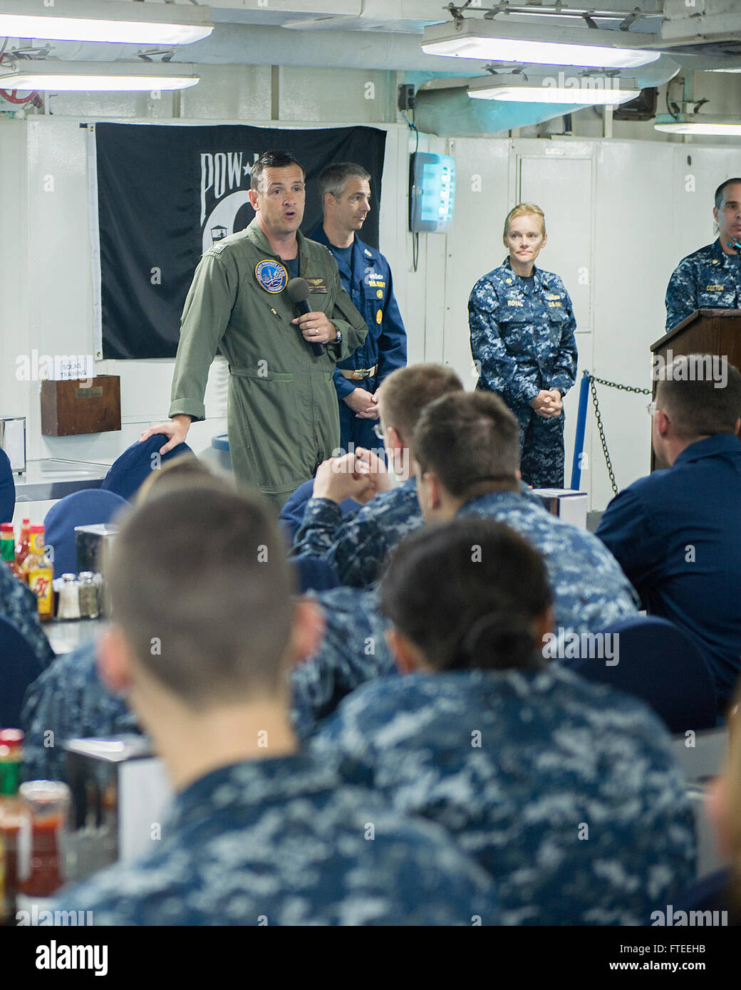 140530-N-EZ054-029  ATLANTIC OCEAN (May 30, 2014) Capt. Craig A. Clapperton, commanding officer of the USS Mount Whitney (LCC20) speaks to sailors assigned to the Mount Whitney during an All Hands Call aboard the Mount Whitney. Mount Whitney, homeported in Gaeta, Italy, is the U.S. 6th Fleet flagship and operates with a combined crew of U.S. sailors and Military Sealift Command (MSC) civil service mariners. (U.S. Navy photo by Mass Communication Specialist 3rd Class Luis R. Chavez Jr/Released) Stock Photo