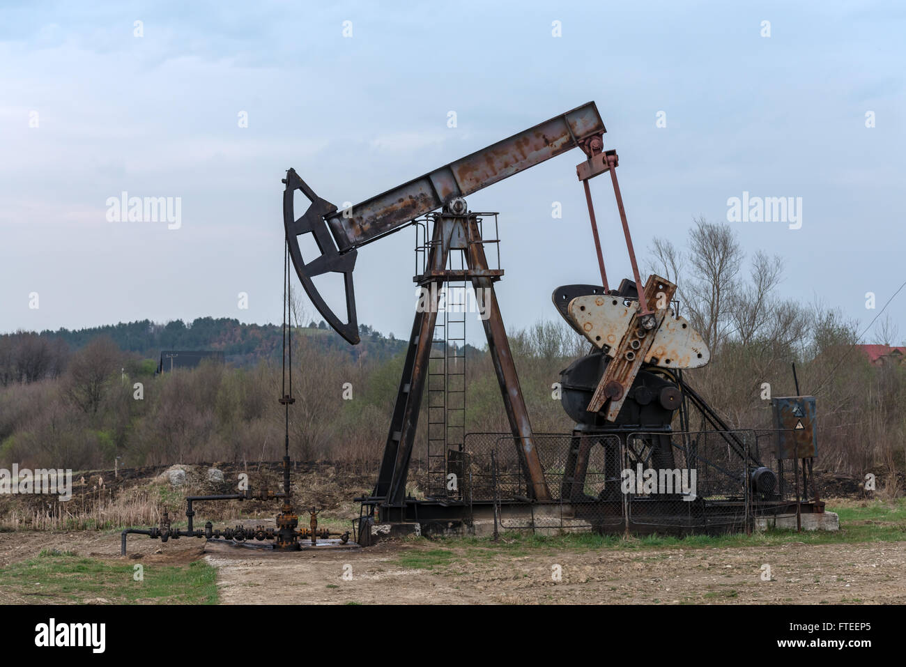 oil pump against blue sky Stock Photo
