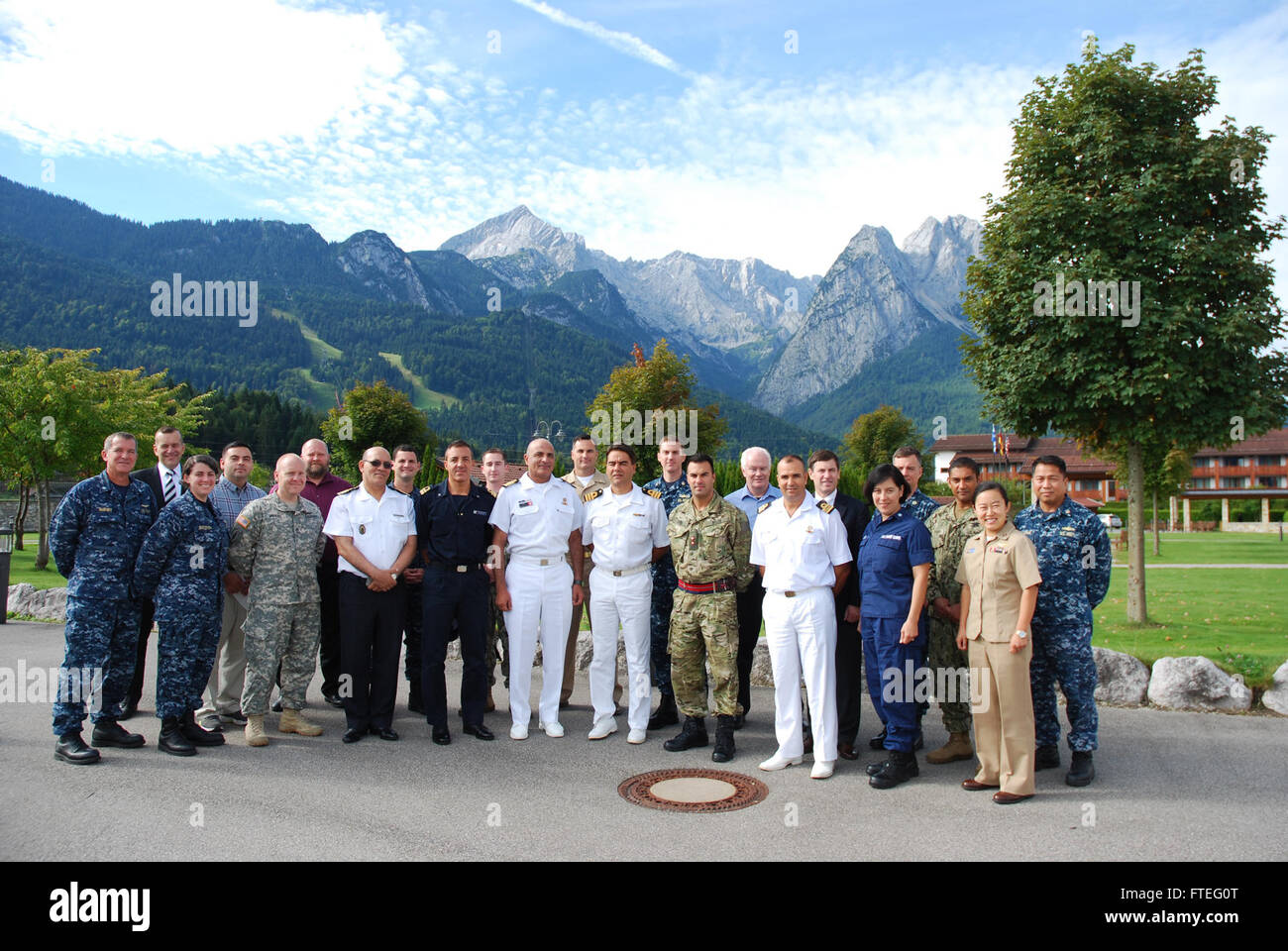 GARMISCH, Germany (Aug. 25, 2014) North African, European and U.S. planners pose for a group photo during the initial planning event for Phoenix Express 2015. Phoenix Express is a U.S. Africa Command-sponsored multinational maritime exercise between North African, European and U.S. naval forces designed to increase maritime safety and security in the Mediterranean Sea. (U.S. Navy photo by U.S. Navy photo by Lt. Miguel Montalvo/RELEASED) Stock Photo