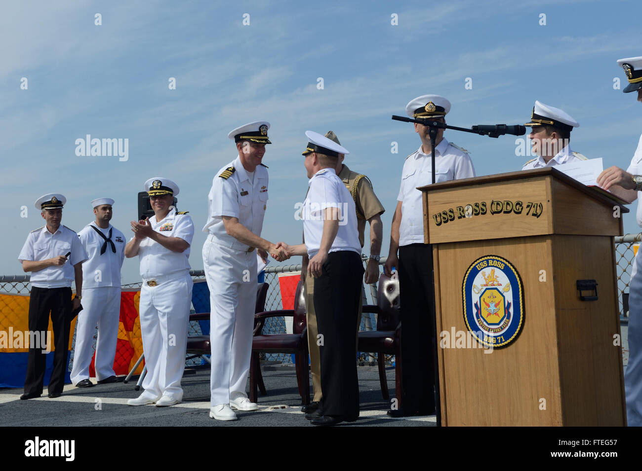 140908-IY142-258 BLACK SEA (September 8, 2014) Vice Admiral Serhiy Hayduk, Commander in Chief Ukrainian navy, center-right, shakes hands with exercise director, Commodore James Aiken, commander, Destroyer Squadron 60, after the conclusion of the opening ceremony of exercise Sea Breeze 2014 aboard the Arleigh Burke-class guided-missile destroyer USS Ross (DDG 71). Ross, forward deployed to Rota, Spain, is conducting naval operations in the U.S. 6th Fleet area of operations in support of U.S. national security interests in Europe. (U.S. Navy photo by Mass Communication Specialist 2nd Class John  Stock Photo