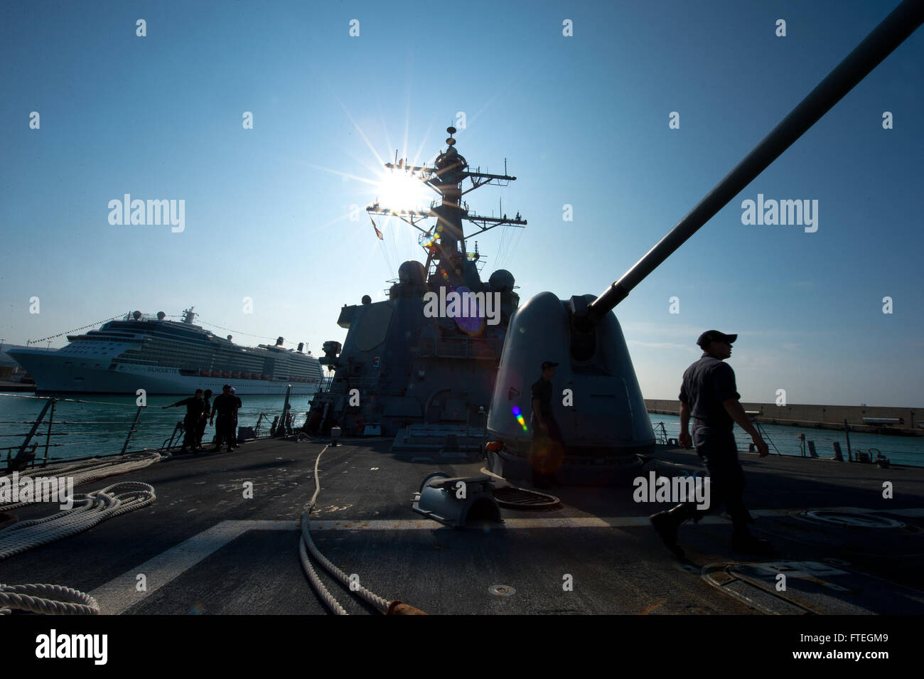 CIVITAVECCHIA, Italy (Oct. 4, 2014) The guided-missile destroyer USS Arleigh Burke (DDG 51) departs Civitavecchia, Italy after a scheduled port visit. Arleigh Burke, homeported in Norfolk, Va., is conducting naval operations in the U.S. 6th Fleet area of operations in support of U.S. national security interests in Europe. Stock Photo
