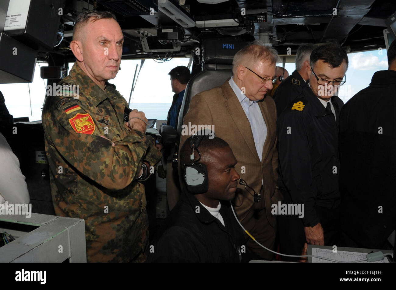 MEDITERRANEAN SEA (Oct. 30, 2014) Distinguished visitors from various Baltic nations tour the aircraft carrier USS George H.W. Bush (CVN 77). George H.W. Bush, homeported in Norfolk, Va., is conducting naval operations in the U.S. 6th Fleet area of operations in support of U.S. national security interests in Europe. Stock Photo