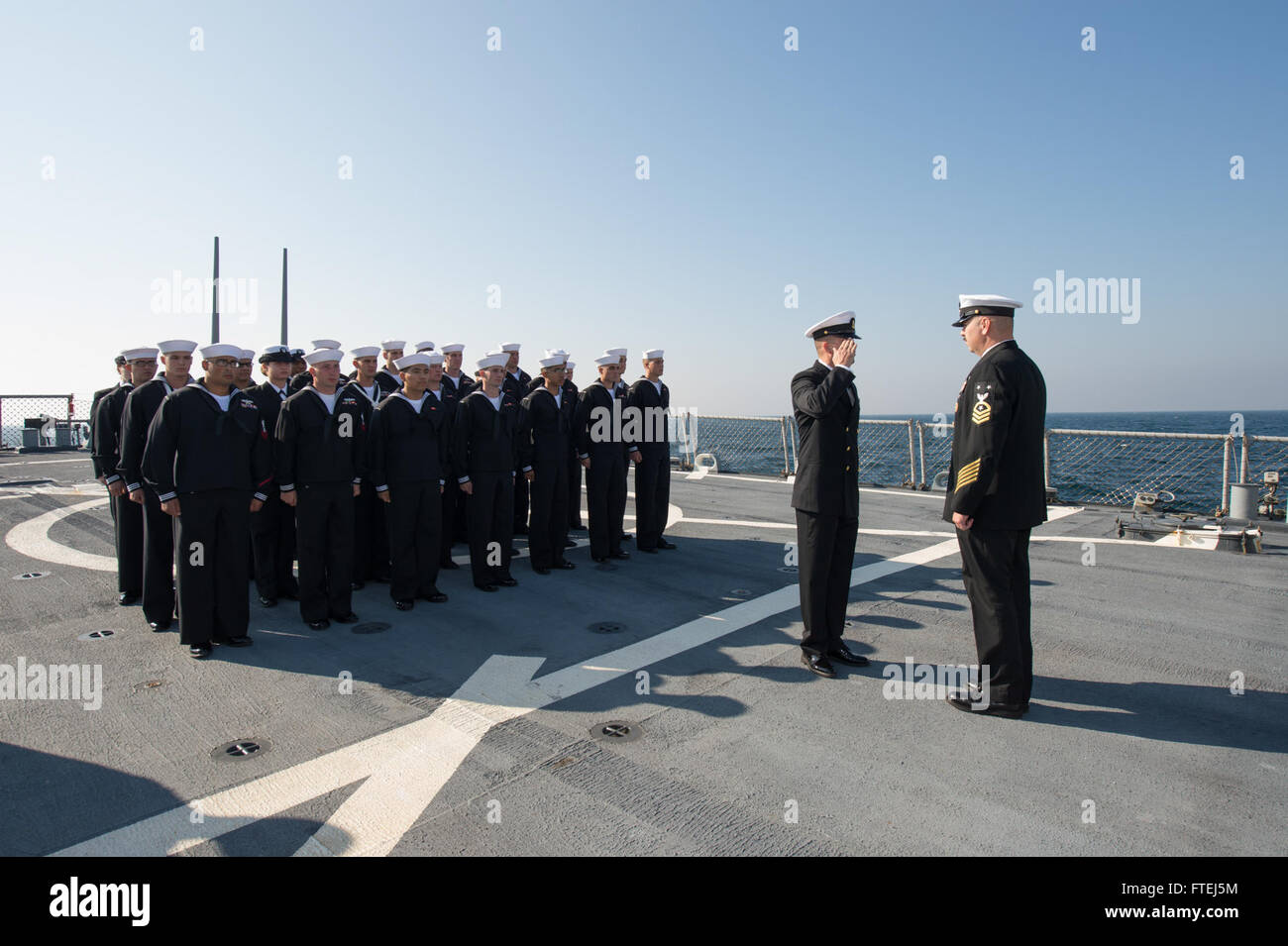 BLACK SEA (Nov. 6, 2014) - Sailors aboard the USS Ross (DDG 71) conduct a dress blue uniform inspection. Ross is an Arleigh Burke-class guided-missile destroyer, homeported in Rota, Spain, conducting naval operations in the U.S. 6th Fleet area of operations in support of U.S. national security interest in Europe. Stock Photo