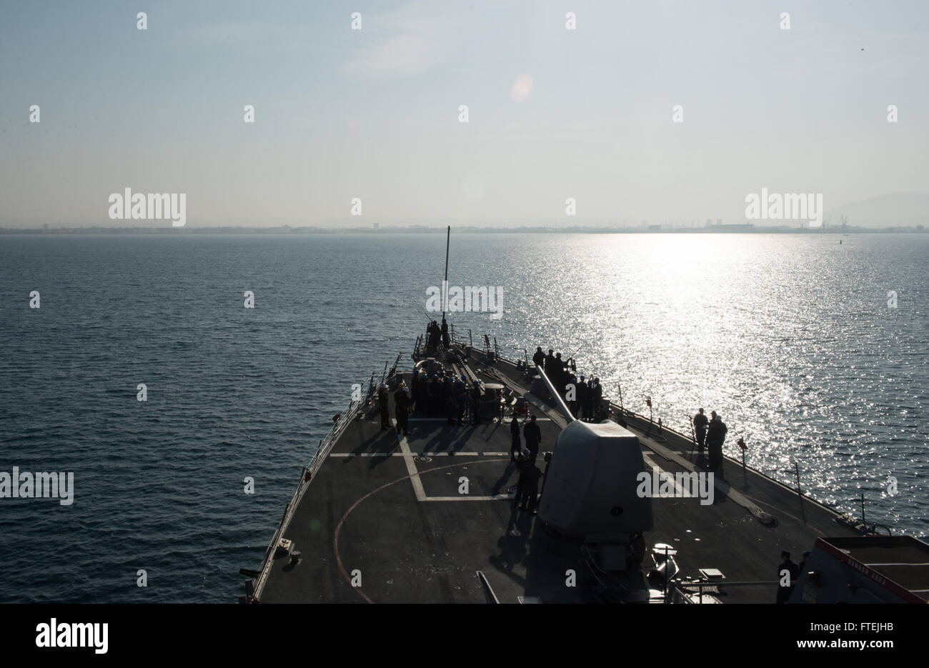 MEDITERRANEAN SEA (Dec. 7, 2014) - USS Donald Cook (DDG 75) prepares to pull in to Haifa, Israel for a scheduled port visit, Dec. 7, 2014. Donald Cook, an Arleigh Burke-class guided-missile destroyer, forward-deployed to Rota, Spain, is conducting naval operations in the U.S. 6th Fleet area of operations in support of U.S. national security interests in Europe. Stock Photo