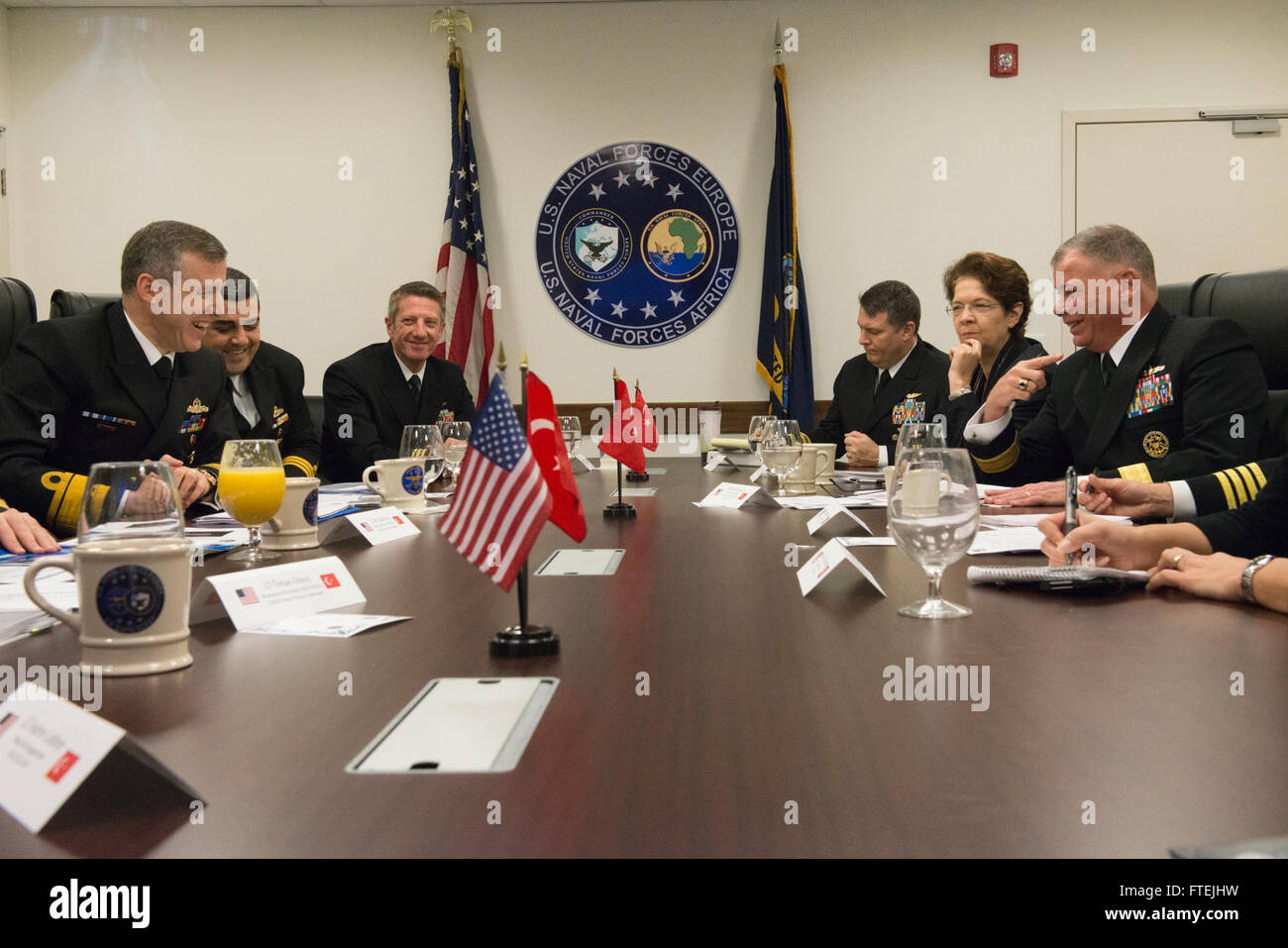 (Dec. 10, 2014) Turkish navy Rear Adm. Oguz Karaman, head of Turkish Naval Forces Command’s Plans and Policy Division, left, meets with Rear Adm. John Nowell, chief of staff, U.S. Naval Forces Europe-Africa, at Naval Support Activity Naples, Dec. 10, 2014. U.S. Naval Forces Europe-Africa/U.S. 6th Fleet staff hosted a Turkish naval delegation to discuss future opportunities to strengthen interoperability. Stock Photo