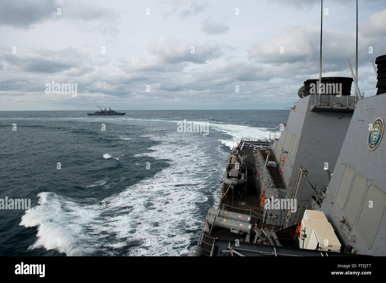 BLACK SEA (Dec. 28, 2014) USS Donald Cook (DDG 75) conducts maneuvers with the Turkish navy Dec. 28, 2014. Donald Cook, an Arleigh Burke-class guided-missile destroyer, forward-deployed to Rota, Spain, is conducting naval operations in the U.S. 6th Fleet area of operations in support of U.S. national security interests in Europe. Stock Photo