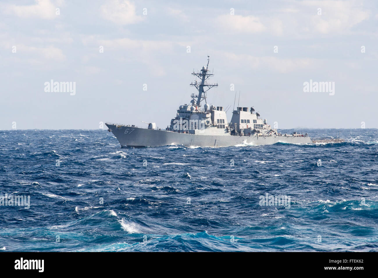150109-N-XG464-155 MEDITERRANEAN SEA (Jan. 9, 2015) The Arleigh Burke-class guided-missile destroyer USS Cole (DDG 67) operates in the Mediterranean Sea Jan. 9, 2015. Cole, homeported in Norfolk, is conducting naval operations in the U.S. 6th Fleet area of operations in support of U.S. national security interests in Europe. (U.S. Navy photo by Mass Communication Specialist 3rd Class Jonathan B. Trejo/Released) Stock Photo