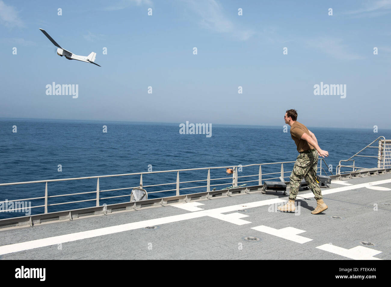 150116-N-JP249-066 ATLANTIC OCEAN (Jan. 16, 2015) Intelligence Specialist 2nd Class Joshua Lesperance, from Spring Valley, Illinois, watches as a Puma Unmanned Aircraft System from the Coastal Riverine Force departs the Military Sealift Command’s joint high-speed vessel USNS Spearhead (JHSV 1) Jan. 16, 2015. Spearhead is on a scheduled deployment to the U.S. 6th Fleet area of operations in support of the international collaborative capacity-building program Africa Partnership Station. (U.S. Navy photo by Mass Communication Specialist 2nd Class Kenan O’Connor/Released) Stock Photo