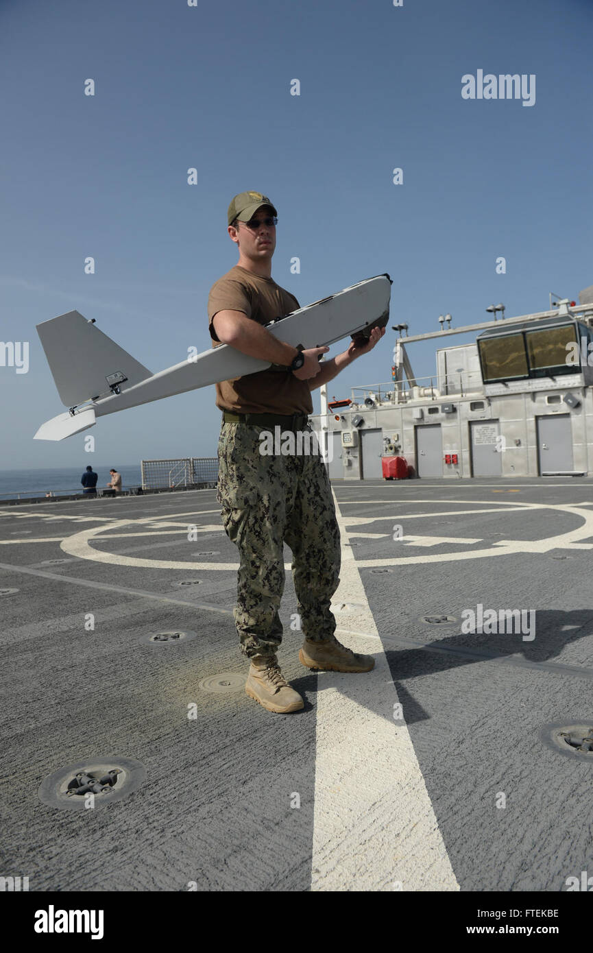150117-N-RB579-195 ATLANTIC OCEAN (Jan. 17, 2015) Information Systems Technician 2nd Class Joshua Lesperance, from Spring Valley, Illinois, prepares to launch a PUMA small unmanned aircraft system off the Military Sealift Command’s joint high-speed vessel USNS Spearhead (JHSV 1) Jan. 17, 2015. Spearhead is on a scheduled deployment to the U.S. 6th Fleet area of operations in support the international collaborative capacity-building program Africa Partnership Station. (U.S. Navy photo by Mass Communication Specialist 1st Class Joshua Davies/Released) Stock Photo