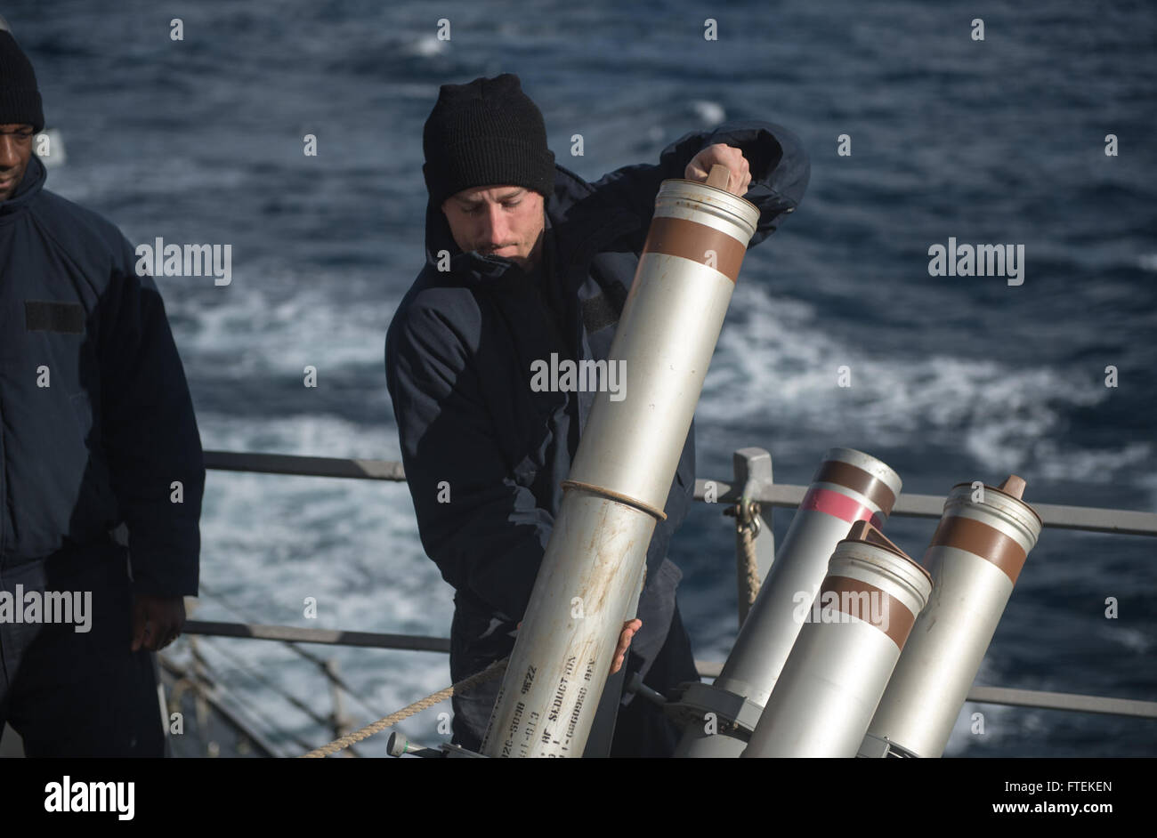 MEDITERRANEAN SEA (Jan. 23, 2015) Cryptologic Technician 2nd Class Thomas Helsel, from Lordstown, Ohio, downloads anti-ship missile defense CHAFF rounds aboard USS Donald Cook (DDG 75) Jan. 23, 2015. Donald Cook, an Arleigh Burke-class guided-missile destroyer, forward-deployed to Rota, Spain, is conducting naval operations in the U.S. 6th Fleet area of operations in support of U.S. national security interests in Europe. Stock Photo