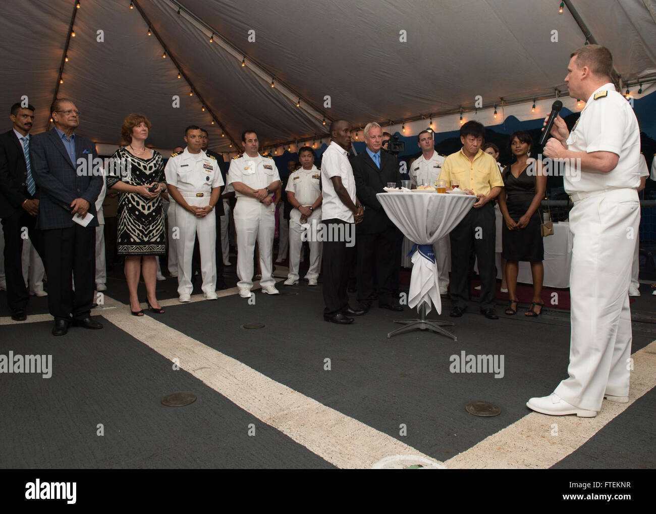 PORT LOUIS, Mauritius (Feb. 3, 2015) Rear Adm. Tom Reck, vice commander, U.S. 6th Fleet, right, addresses attendees during a reception aboard the Oliver Hazard Perry-class guided-missile frigate USS Simpson (FFG 56) Feb. 3, 2015. Simpson is in Port Louis, Mauritius after completing the underway phase of Exercise Cutlass Express 2015. This exercise, sponsored by U.S. Africa Command, is designed to improve regional cooperation, maritime domain awareness and information sharing practices to increase capabilities of East African and Indian Ocean nations to counter sea-based illi Stock Photo
