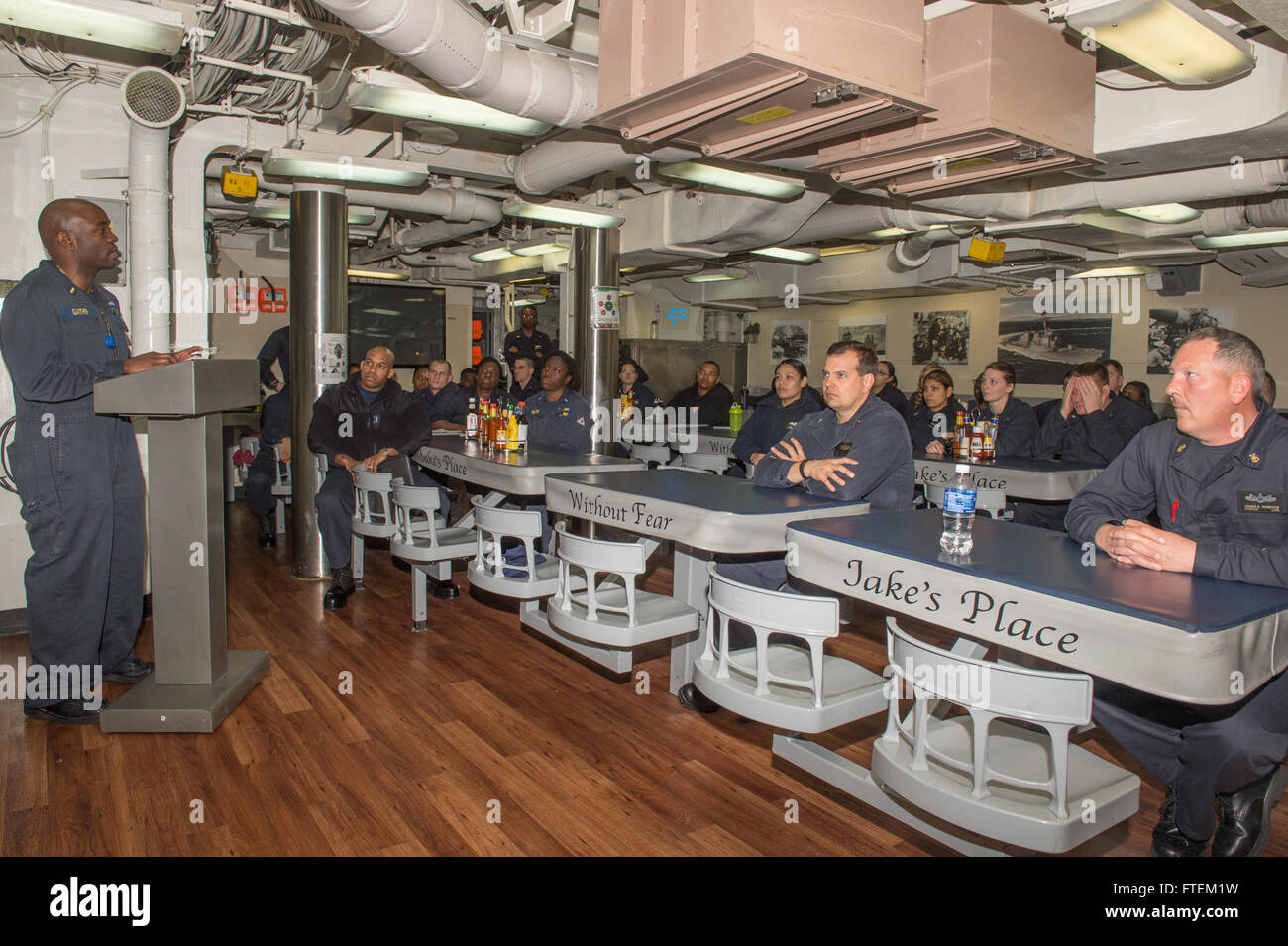 ATLANTIC OCEAN (Feb. 19, 2015) Ensign William Gaither, III, originally from Atlanta, and serving as USS Laboon (DDG 58) Operations Department division officer, speaks during a Black History Month Celebration aboard the ship Feb. 19, 2015. Laboon, an Arleigh Burke-class guided-missile destroyer home ported in Norfolk, is underway conducting naval operations in the U.S. 6th Fleet area of operations in support of U.S. national security interests in Europe. Stock Photo