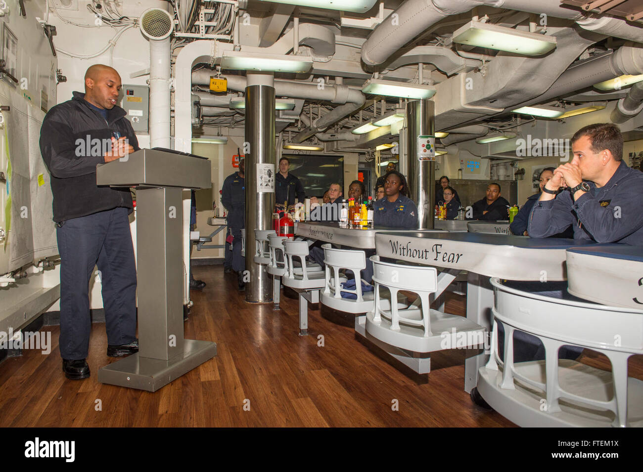 ATLANTIC OCEAN (Feb. 19, 2015) Lt. j. g. Marquis Jones, USS Laboon (DDG 58) command chaplain, speaks about Dr. Martin Luther King, Jr., during a Black History Month Celebration aboard ship, Feb. 19, 2015. Laboon, an Arleigh Burke-class guided-missile destroyer home ported in Norfolk, is underway conducting naval operations in the U.S. 6th Fleet area of operations in support of U.S. national security interests in Europe. Stock Photo