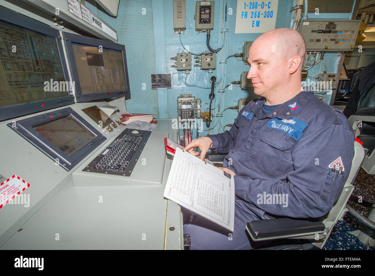 ATLANTIC OCEAN (Feb. 22, 2015) Gas Turbine System Technician (Mechanical) 1st Class Robert Meade, from Langhorne, Pennsylvania, starts a main engine onboard USS Laboon (USS 58) Feb. 22, 2015. Laboon, an Arleigh Burke-class guided-missile destroyer home ported in Norfolk,, is underway conducting naval operations in the U.S. 6th Fleet area of operations in support of U.S. national security interests in Europe. Stock Photo