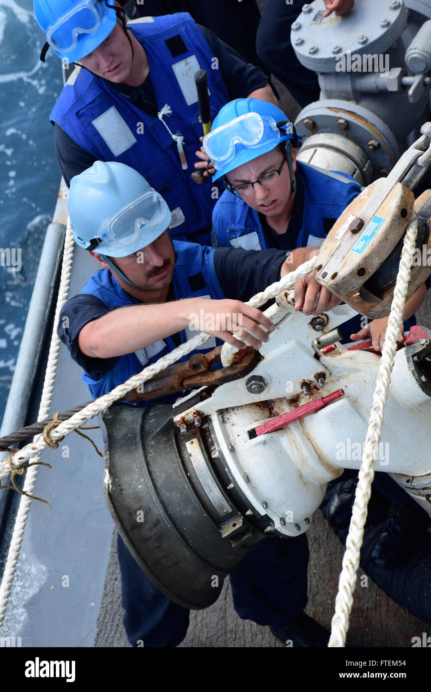 HORN OF AFRICA (Feb. 23, 2015) Boatswain’s Mate Seaman Ashley Herman connects a span wire to a refueling station aboard USS Oscar Austin (DDG 79) during an underway replenishment with the Royal Australian navy ship HMAS Success (OR 304) Feb. 23, 2015. Oscar Austin, an Arleigh Burke-class guided-missile destroyer, homeported in Norfolk, is conducting naval operations in the U.S. 6th Fleet area of operations in support of U.S. national security interests in Europe and Africa. Stock Photo