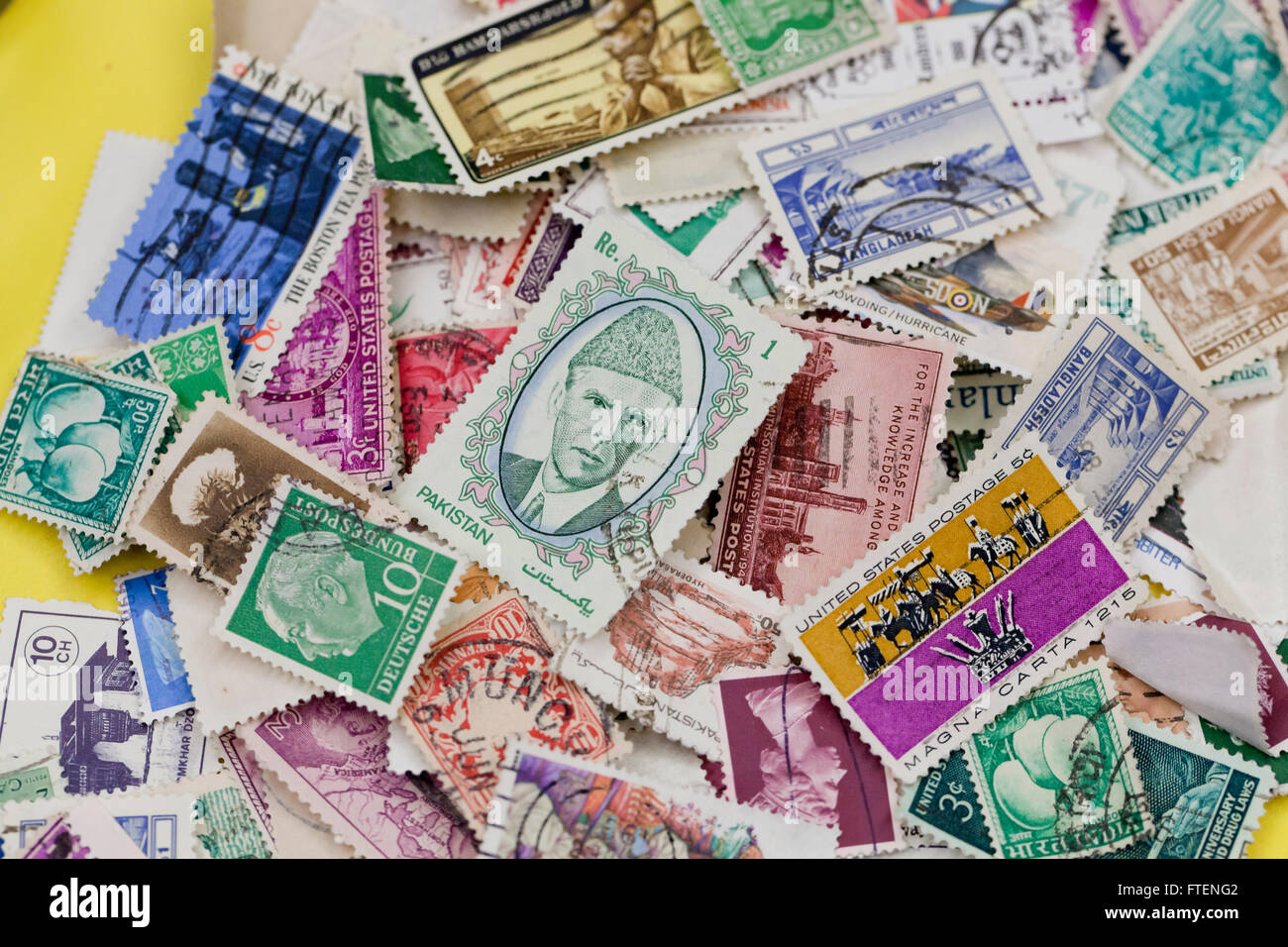 Pile of used stamps Stock Photo