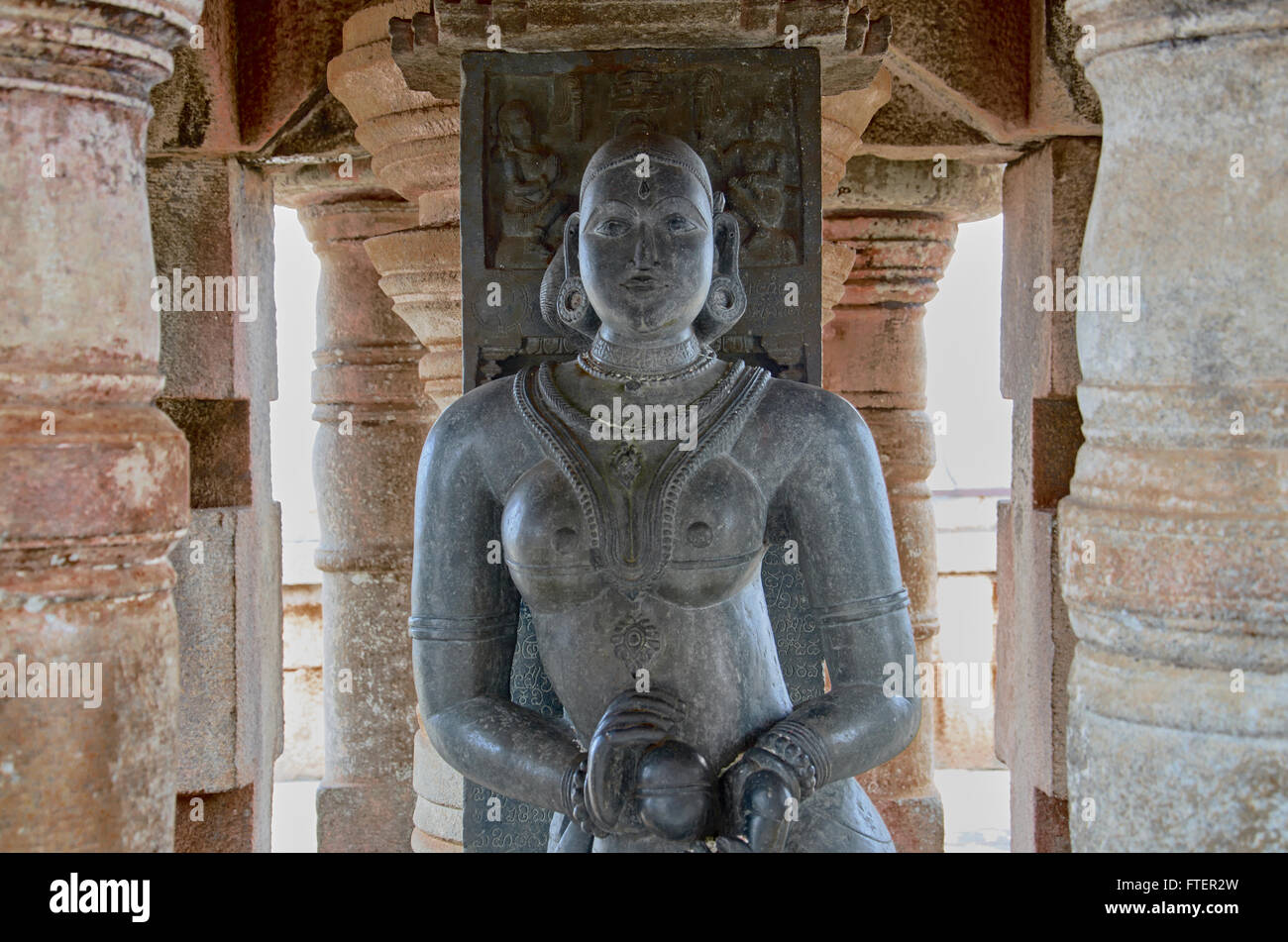 Statue of an old Adivasi women Gulkeyi Ajj at Shravana Belagola - Jain Temple Stock Photo