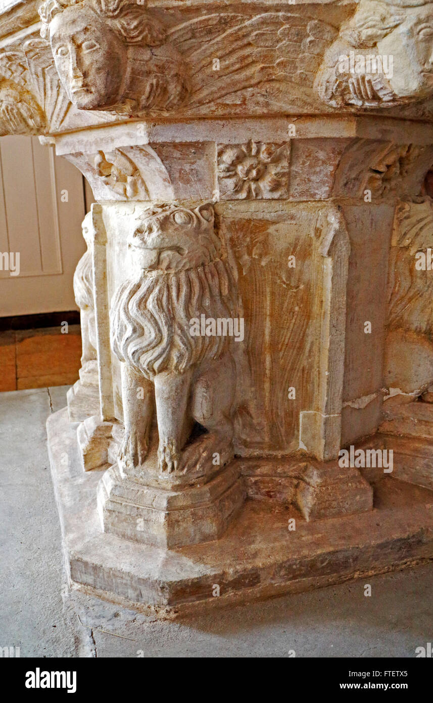 Carved Font stem detail in the parish church of St Mary at Surlingham, Norfolk, England, United Kingdom. Stock Photo