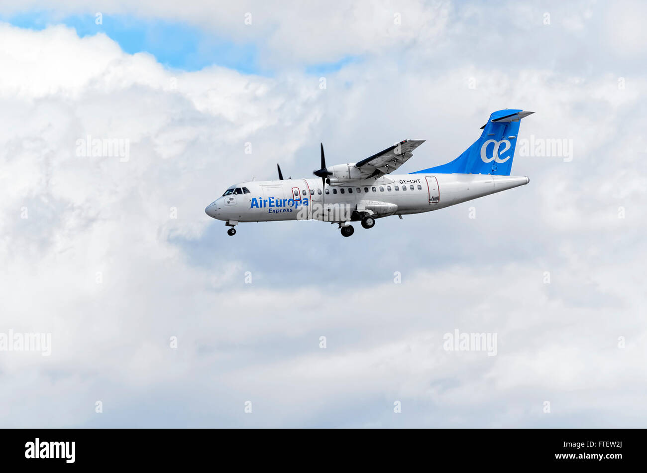 Regional airliner -ATR 42-300-, of -Air Europa Express- airline, is coming, ready to land, to Madrid airport. Photo set: 2 of 3. Stock Photo