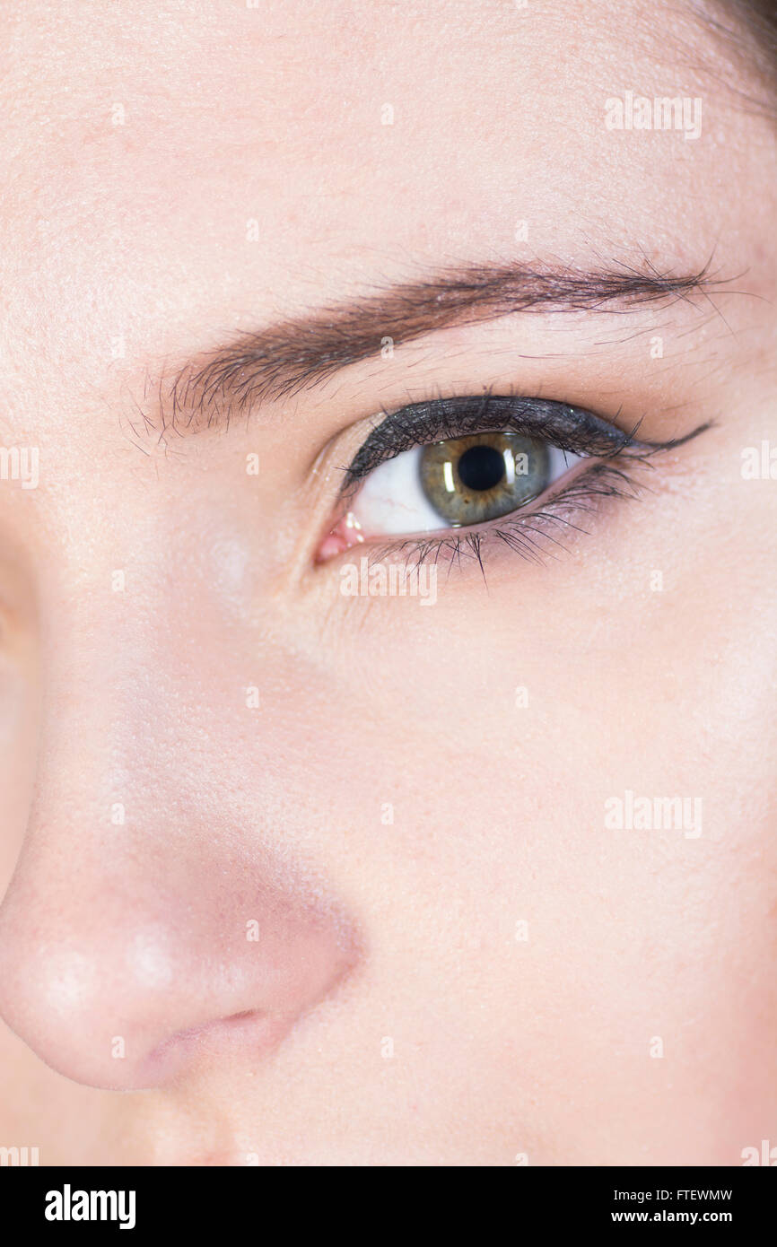 Close up of a young woman's eye staring Stock Photo