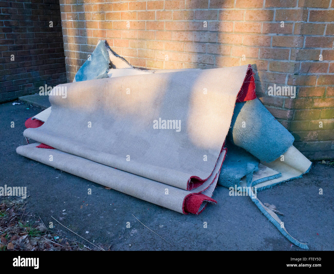 Old Carpet Dumped Outside Stock Photo Alamy