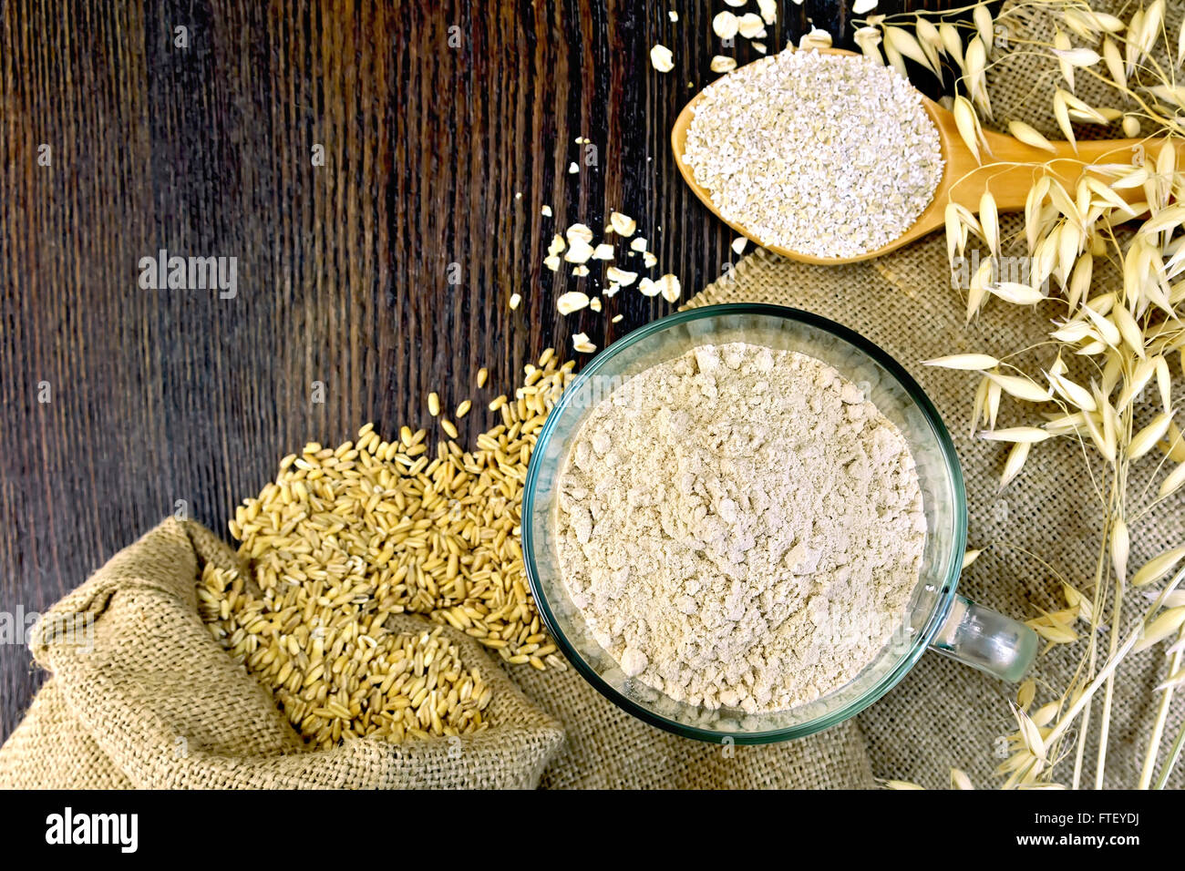 Flour and bran oat on board Stock Photo Alamy
