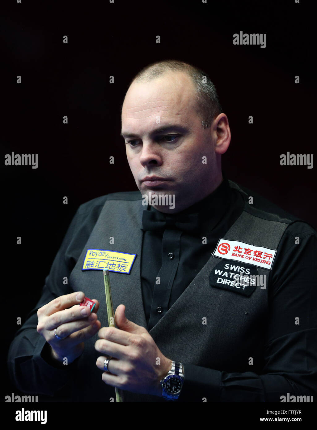 Beijing, China. 28th Mar, 2016. Stuart Bingham of England competes during the wild card round match aganst Cao Yupeng of China at the 2016 World Snooker China Open in Beijing, capital of China, March 28, 2016. Stuart Bingham won 5-0. Credit:  Meng Yongmin/Xinhua/Alamy Live News Stock Photo