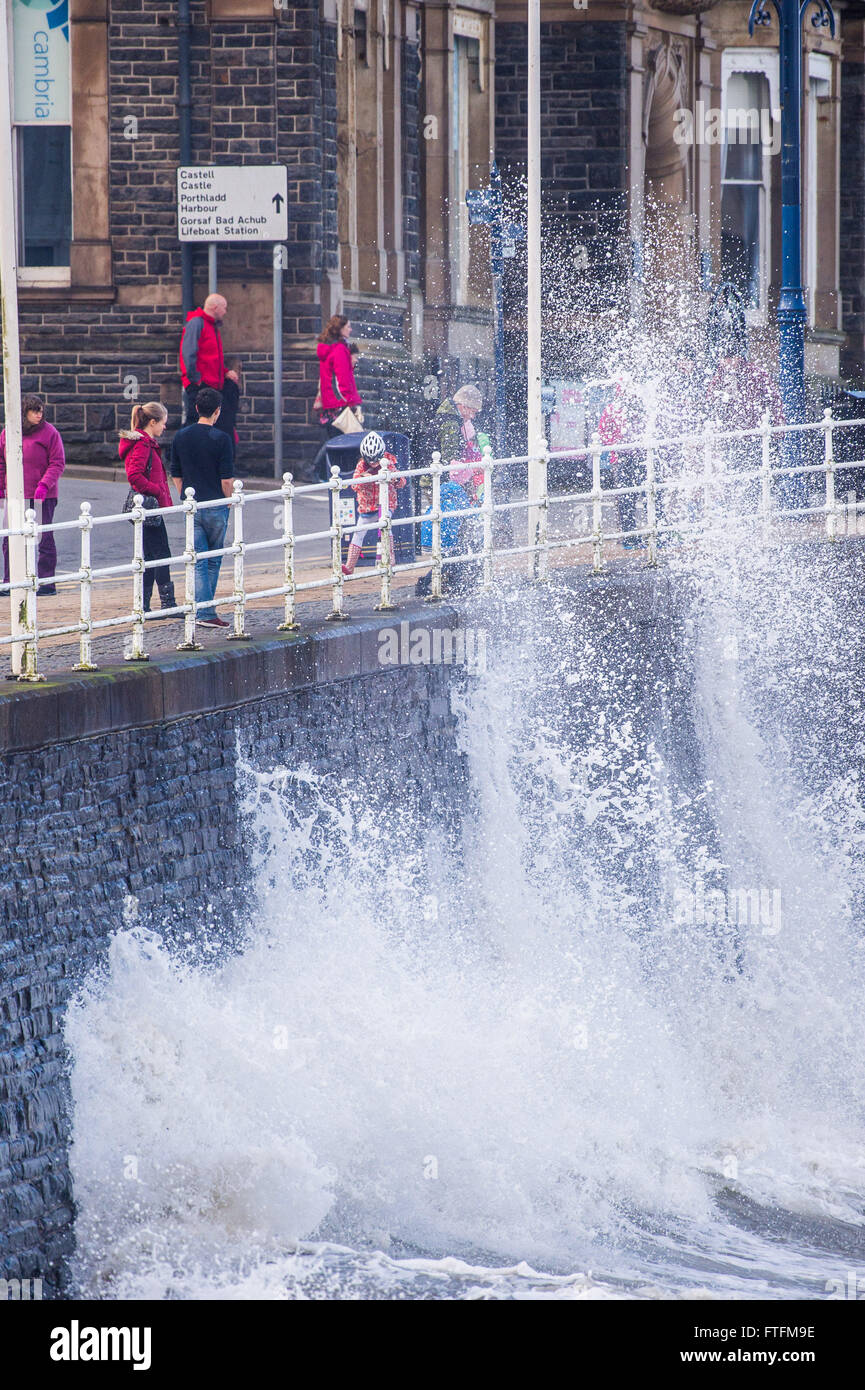 Aberystwyth Wales UK, Easter Monday,  28 March 2016   UK Weather: The strong winds associated with Storm Katie, the latest named storm of the 2015-16 season brings huge waves to batter the seafront at Aberystwyth.   The storm has wrought much damage , specially along the south facing coasts of England, with winds  gusting up to over 100mph in some places in the extreme south west    Credit:  keith morris/Alamy Live News Stock Photo