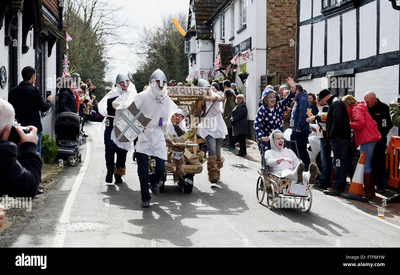 Bolney, Sussex, UK. 28th March, 2016.  Competitors take part in the Bolney Pram Races held every year on Easter Bank Holiday Monday . This year they are raising money for Chailey Heritage and the Service by Emergency Rider Services charities  Credit:  Simon Dack/Alamy Live News Stock Photo