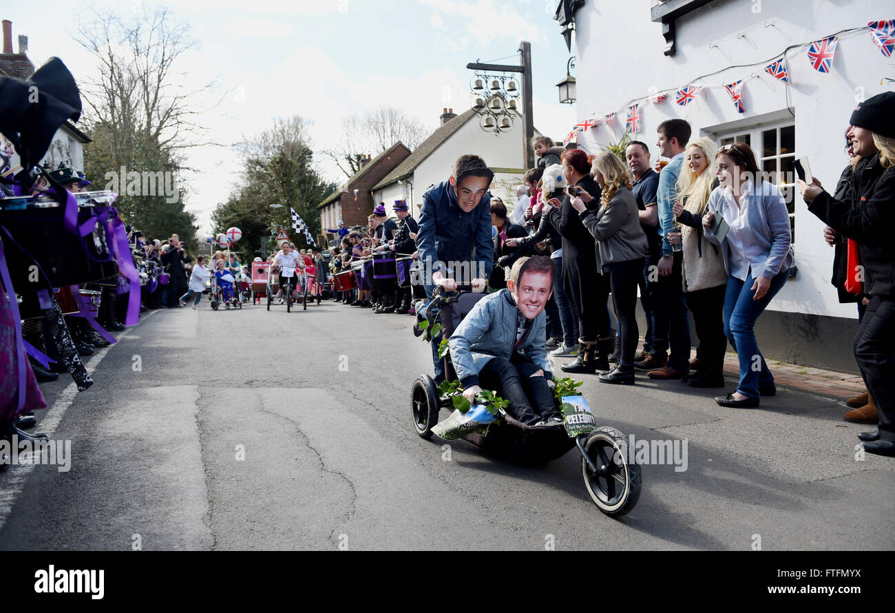 Bolney, Sussex, UK. 28th March, 2016.  Competitors in the Junior section take part in the Bolney Pram Races held every year on Easter Bank Holiday Monday . This year they are raising money for Chailey Heritage and the Service by Emergency Rider Services charities  Credit:  Simon Dack/Alamy Live News Stock Photo