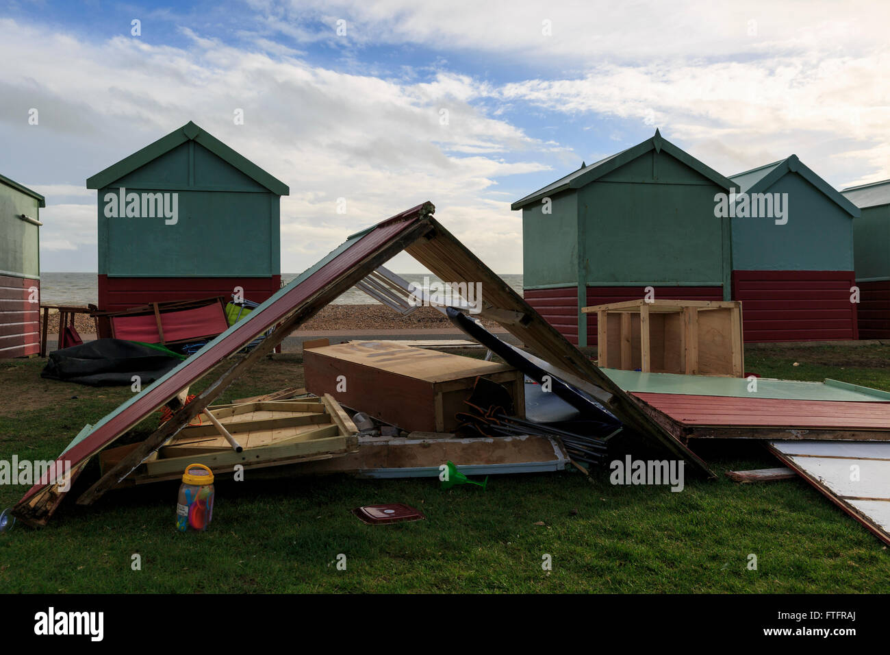 Brighton & Hove, Sussex, UK, 28 March 2016. Aftermath of Storm Katie, which brought 70mph winds to the South Coast of England. At least nine beach huts were up-rooted, significantly damaged or destroyed along the length of seafront in Hove following strong winds overnight. On a short stretch of the Western Lawns promenade, Hove, six beach huts were damaged. Credit:  Clive Jones/Alamy Live News Stock Photo