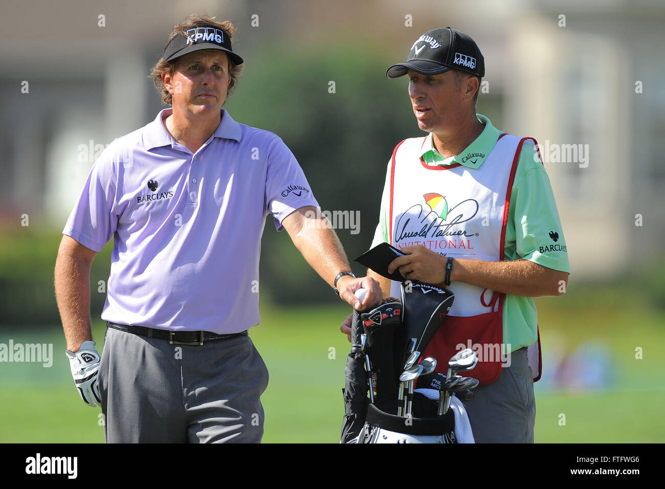 Orlando, Fla, USA. 22nd Mar, 2012. Phil Mickelson and his caddie Jim