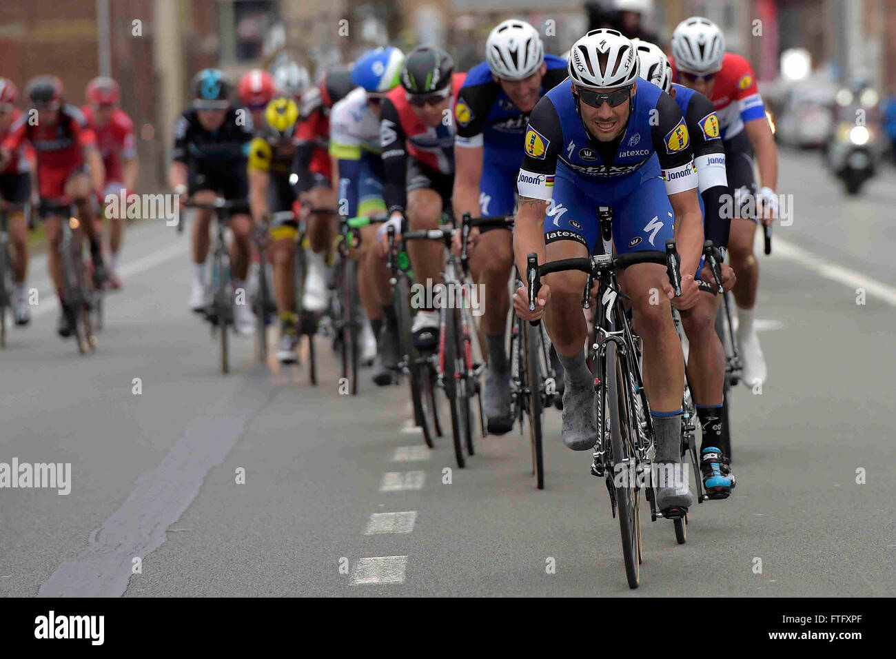 Deinze, Belgium. 27th Mar, 2016. BOONEN Tom (BEL) Rider of ETIXX - QUICK STEP in action during the Flanders Classics UCI World Tour 78nd Gent-Wevelgem cycling race with start in Deinze and finish in Wevelgem © Action Plus Sports/Alamy Live News Stock Photo