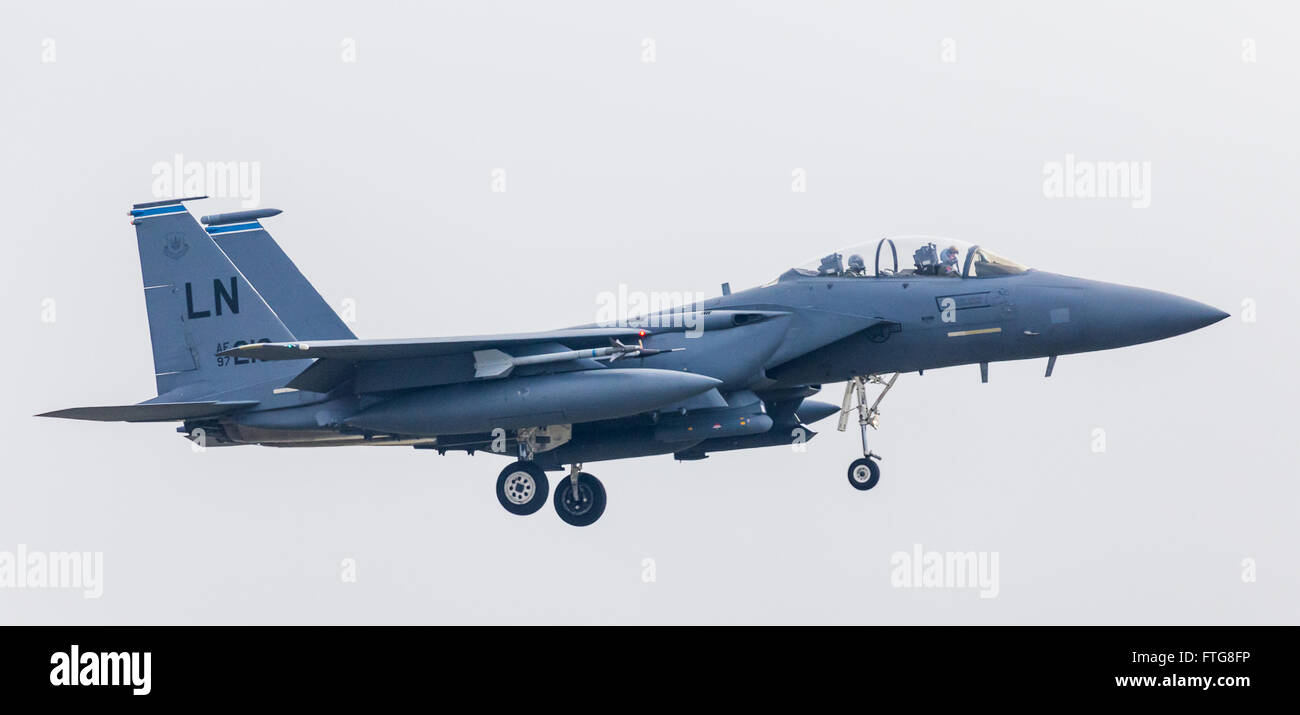 A USAF F-15 Eagle fighter landing at Lakenheath airbase. Stock Photo