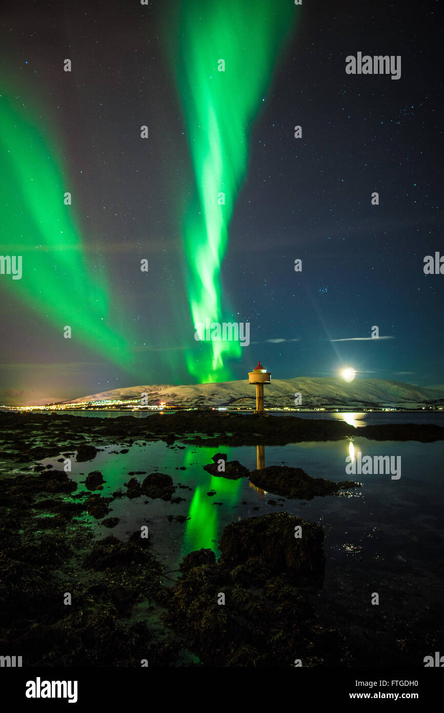 Aurora Borealis dancing over fjord, Tromso Northern Norway Stock Photo ...