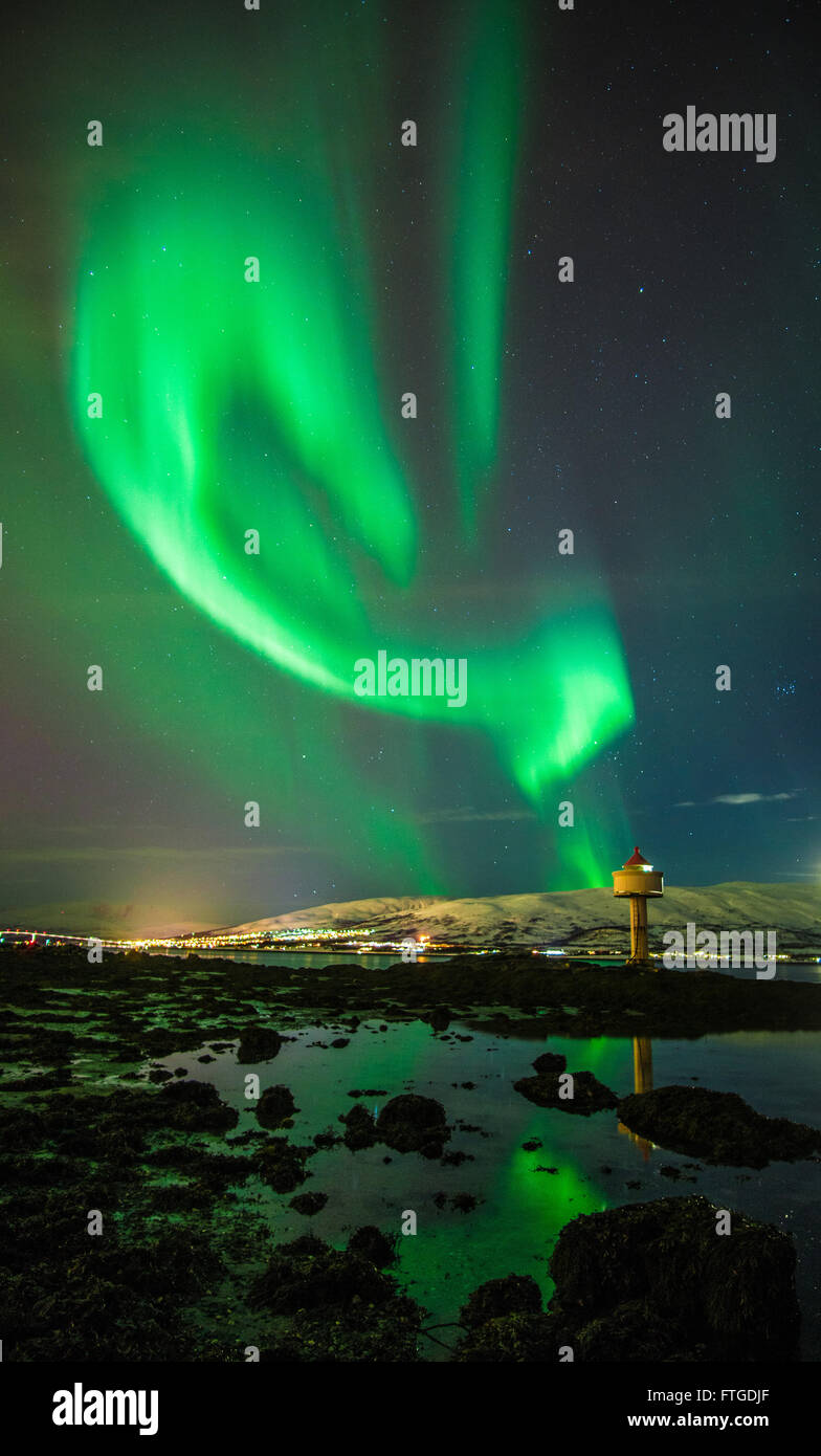 Aurora Borealis dancing over fjord, Tromso Northern Norway Stock Photo ...