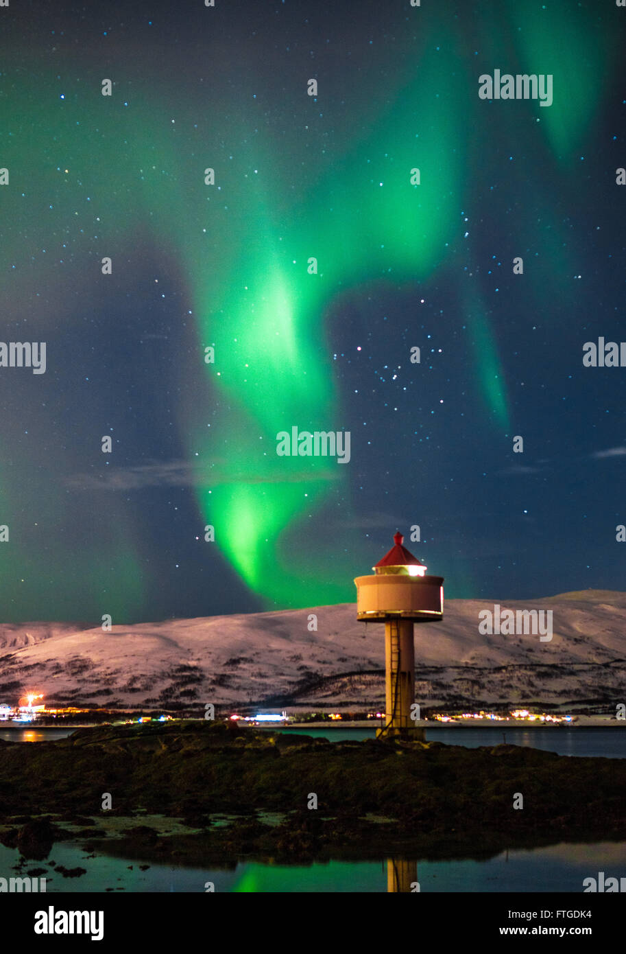 Aurora Borealis dancing over fjord, Tromso Northern Norway Stock Photo ...