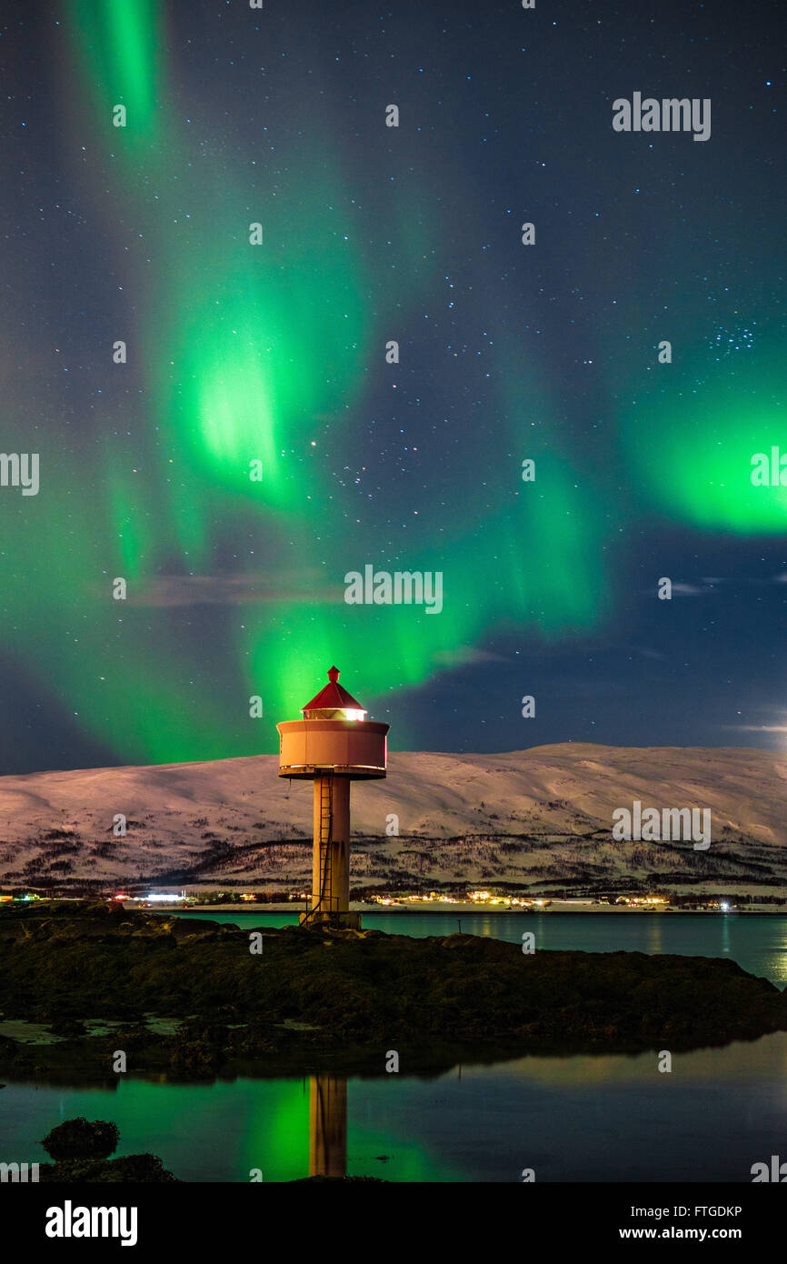 Aurora Borealis dancing over fjord, Tromso Northern Norway Stock Photo ...