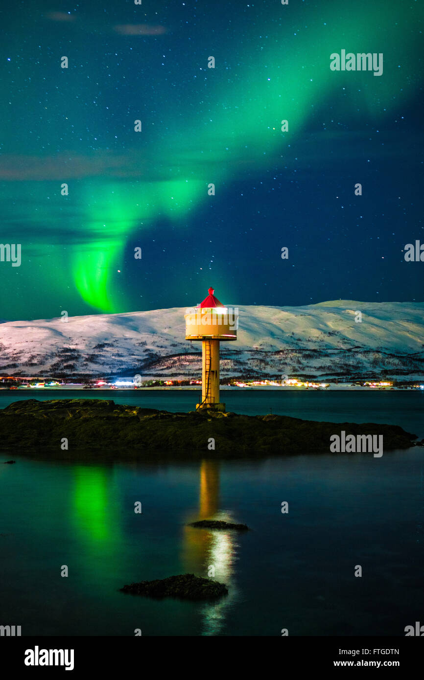 Aurora Borealis dancing over fjord, Tromso Northern Norway Stock Photo ...