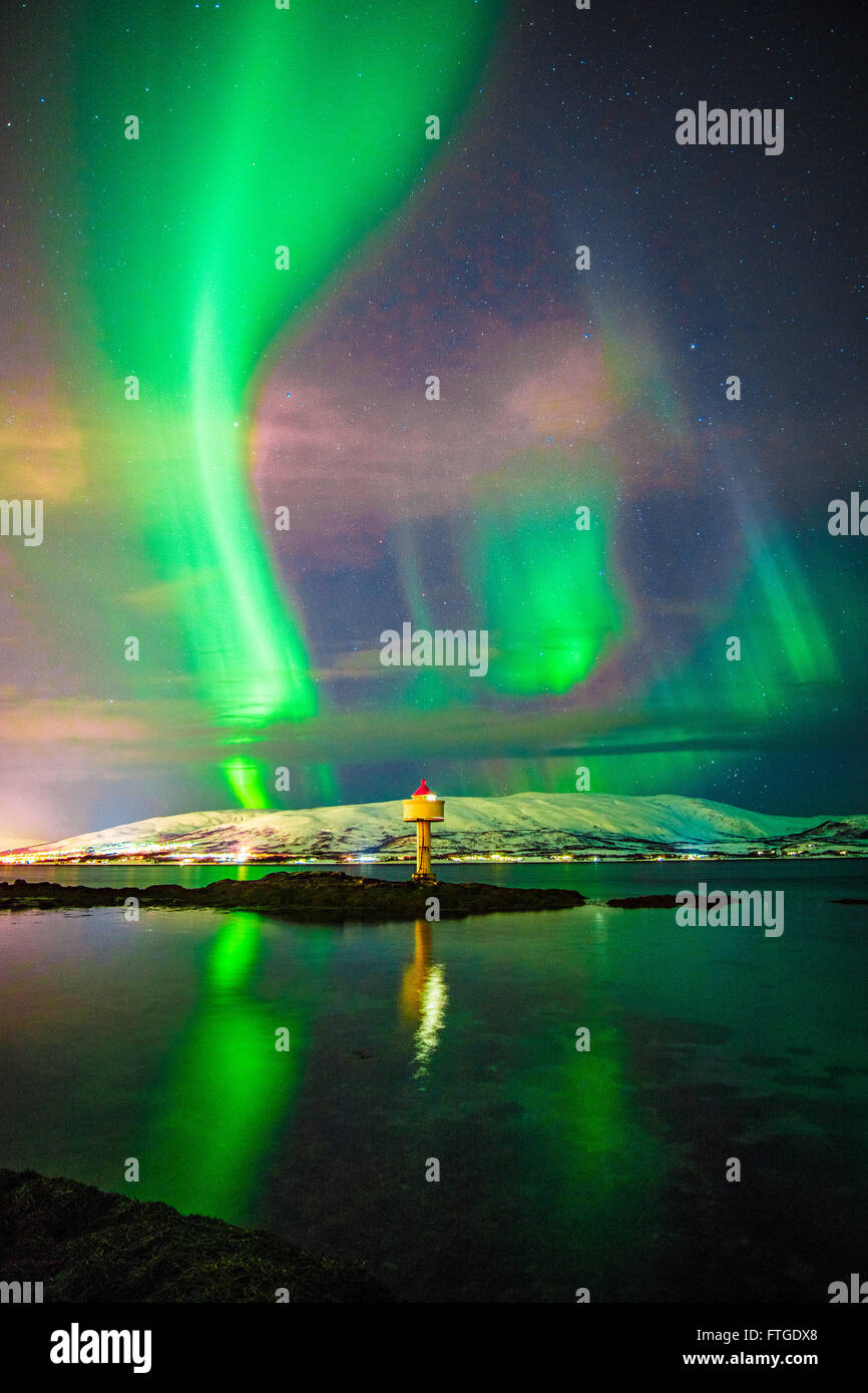 Aurora Borealis dancing over fjord, Tromso Northern Norway Stock Photo ...
