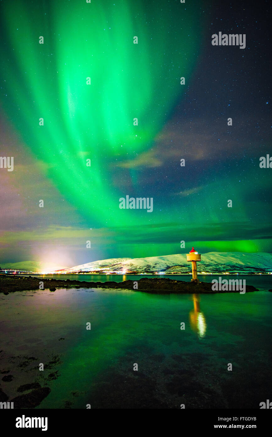 Aurora Borealis dancing over fjord, Tromso Northern Norway Stock Photo ...