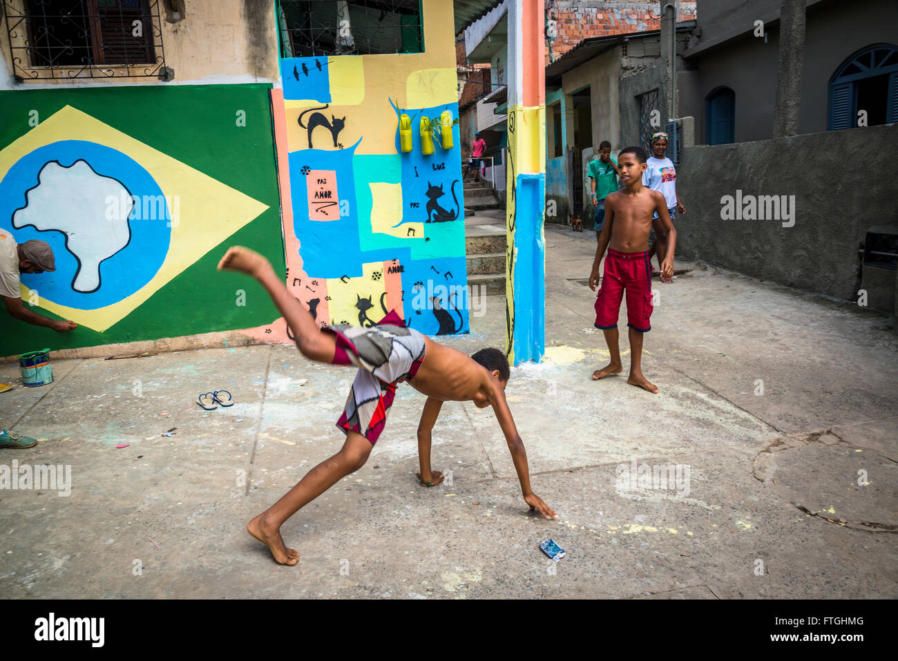 Boys practicing capoeira moves, Gentois community, bairro da Federação, Salvador, Bahia, Brazil Stock Photo