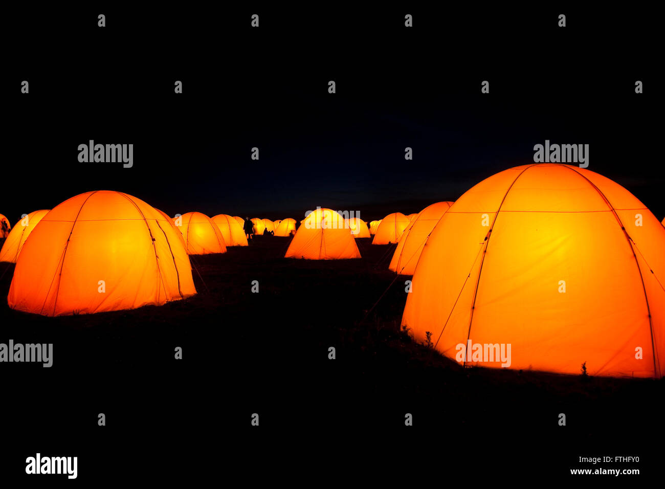 The Peace Camp coastal art installation of illuminated tents and soundscapes at Cuckmere Haven near Eastbourne, East Sussex, Stock Photo
